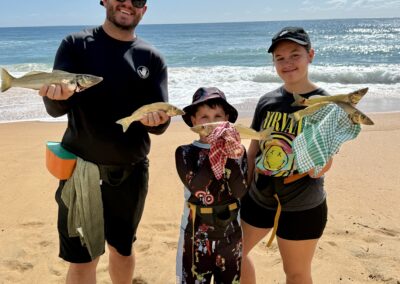 father and his two sons with a beautiful bag of whiting fishing the surf beach. This is a great way to spend a few quality hours learning and it is a sound investment for your future endeavours.